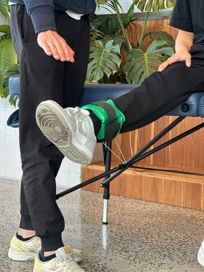 Guided lower-limb strengthening exercise during an in-home physiotherapy session