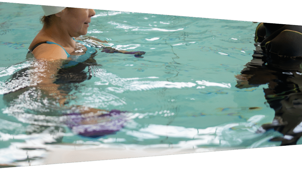 Person doing surgical rehabilitation exercises in hydrotherapy pool