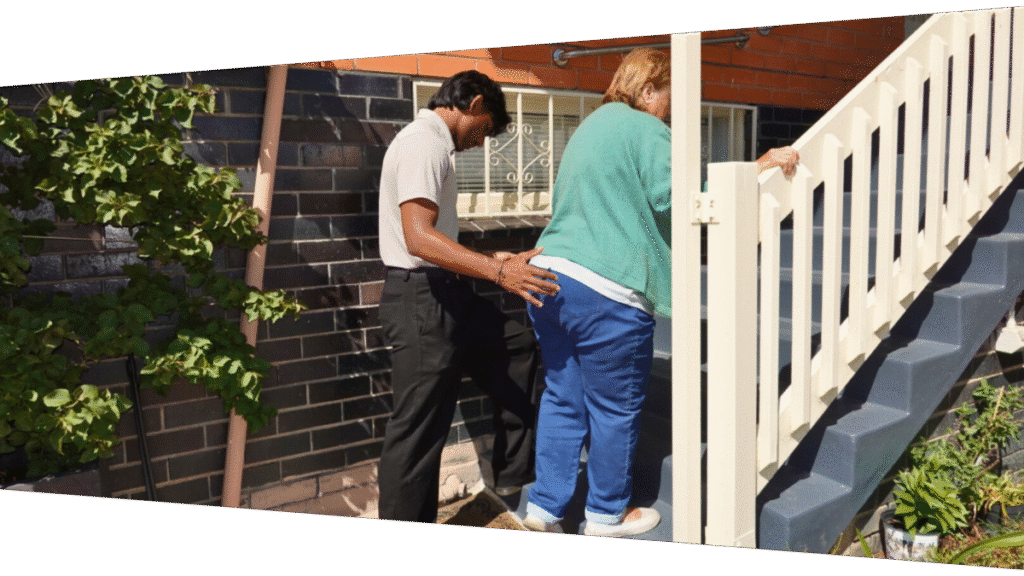 Mobile Physiotherapist practicing mobility and stairs with a patient at their home