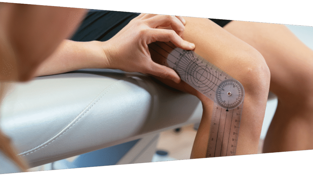 Mobile Physiotherapist measuring patient's knee movement after operation